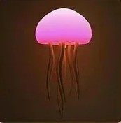 Glowing jellyfish-shaped light on a dark background