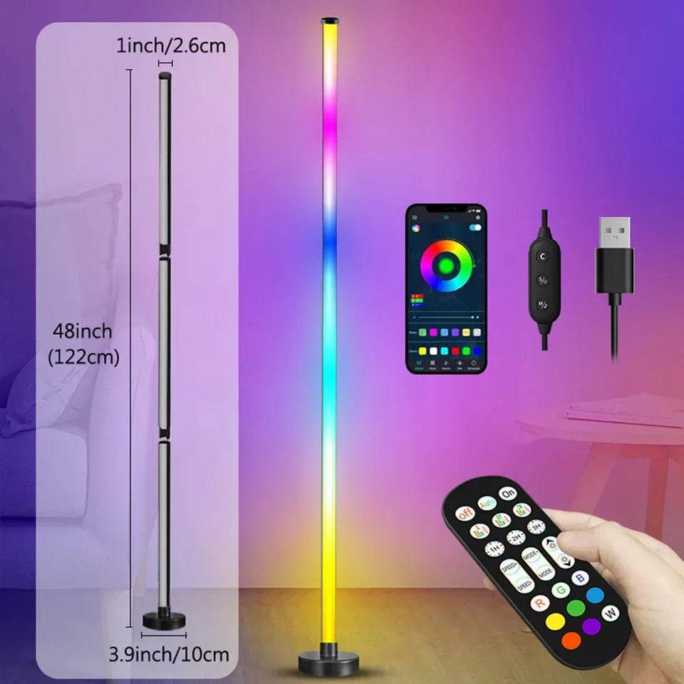 RGB LED floor lamp with remote control, smartphone app, and cable on a gradient background